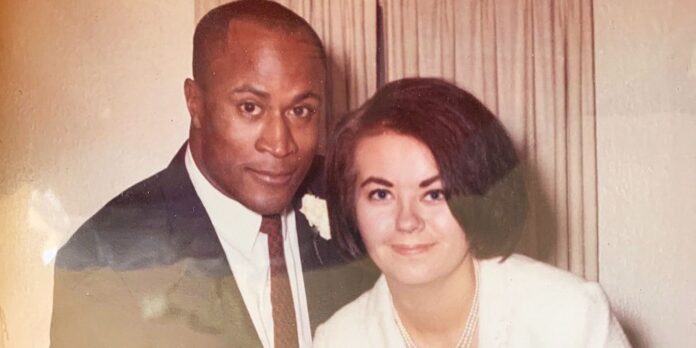 john amos wife noel j. mickelson